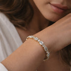 8.08 Carat 14K Gold Emerald and Round Brilliant Cut Bracelet