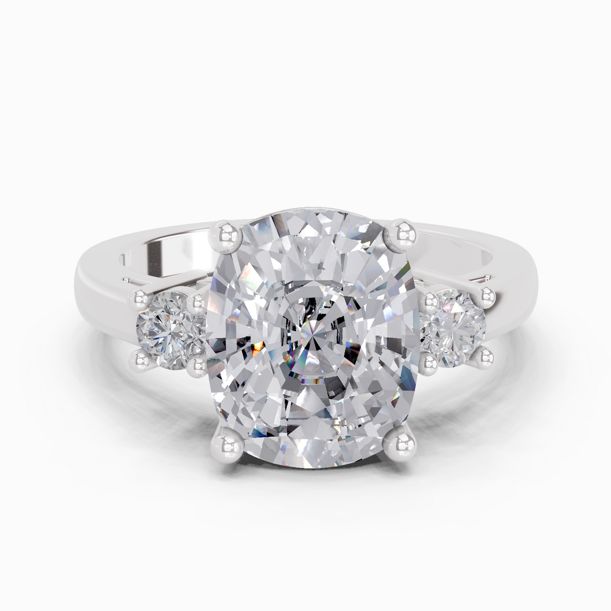 Refined Cushion Three-Stone Diamond Engagement Ring