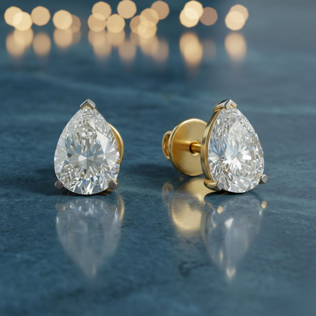 7.35 Carat 14K Gold Pear Stud Earring